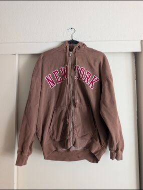 Brandy Melville Brown Zip-Up Hoodie with Red 'New York' Logo